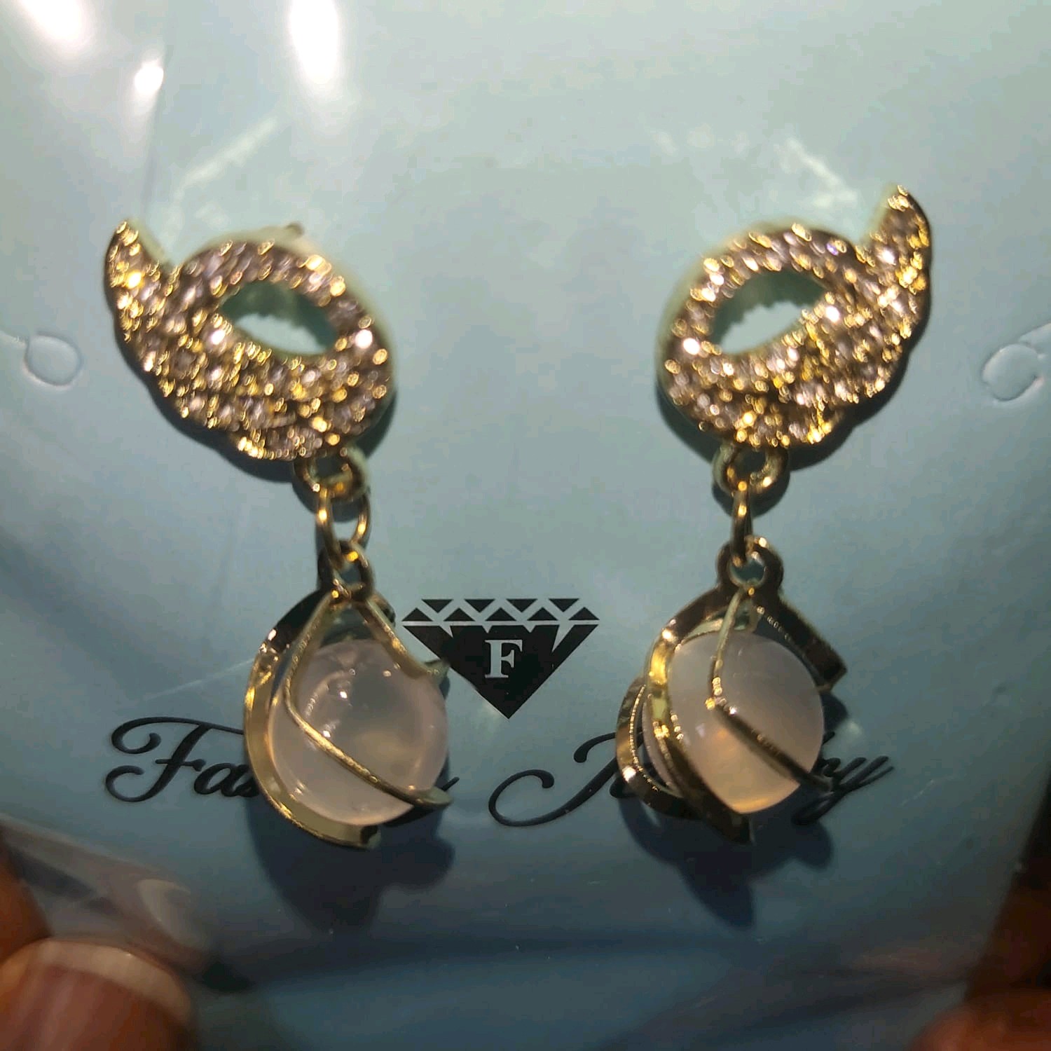 duck stone pearl earrings